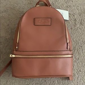 Brown leather backpack purse